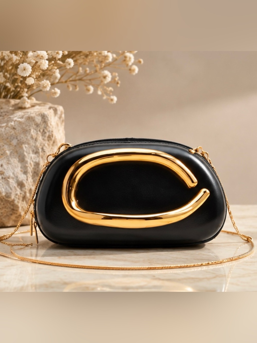 Black Leather Crossbody Bag with Gold Accent